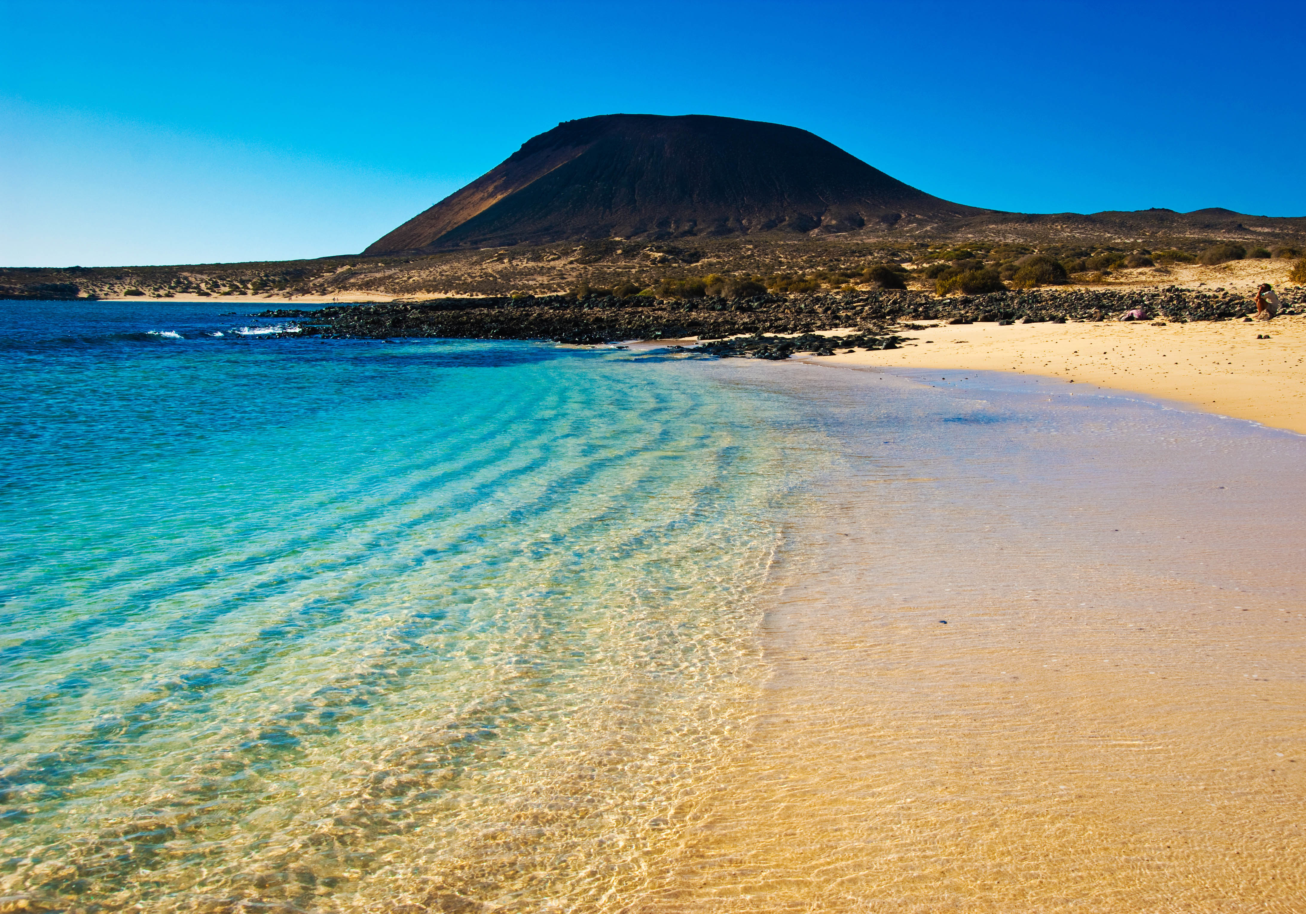 La plage de Las Teresitas, sur l'île de Tenerife, semble tout droit sortie d'un rêve. Les îles La plage de Las Teresitas, sur l'île de Tenerife, semble tout droit sortie d'un rêve. Les îles